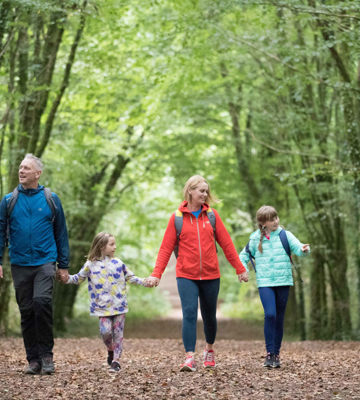 Family of four explore nature trail in County Clare in Ireland